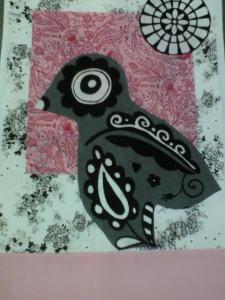 Pink tea towel with appliqued black and white printed fabric, with a splash of pink, with the black and white bird as the focus in the center.